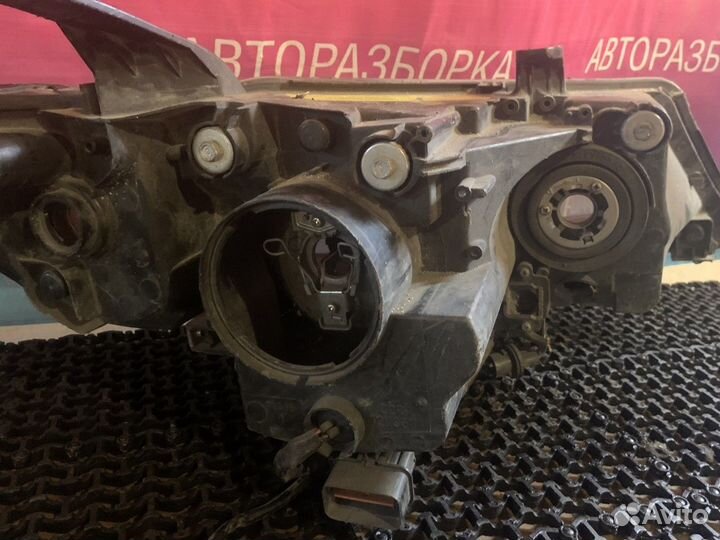 Фара левая xl Mitsubishi Outlander