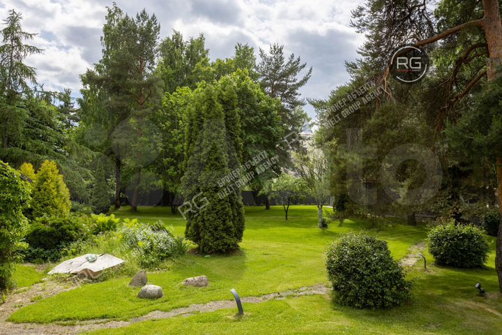 Коттедж 311 м² на участке 35 сот.