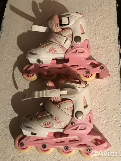 Роликовые коньки