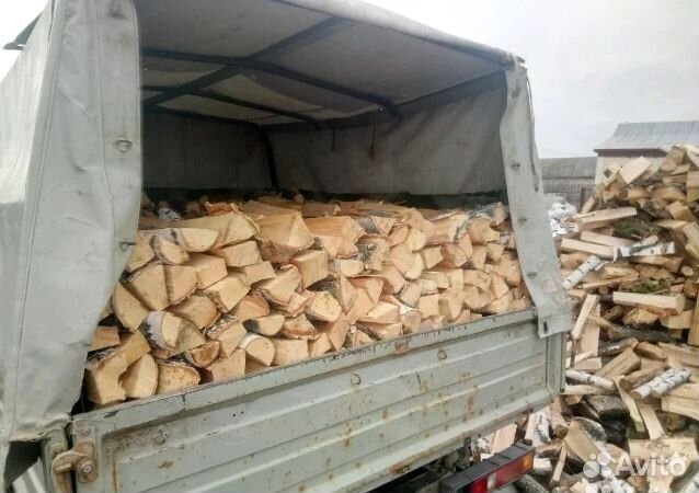 Дрова колотые с укладкой в машине