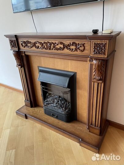 Электрический камин с деревянным порталом