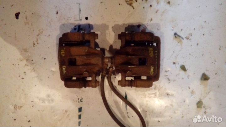 Суппорт тормозной задний Hyundai Tucson