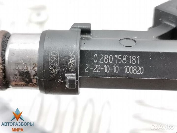 Форсунка Opel Corsa D рест. 2011 24420543