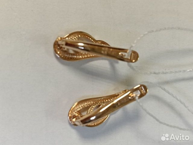 Золотые серьги с камнем