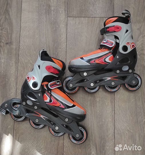 Роликовые коньки