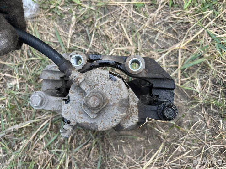 Тормозной суппорт Daewoo Nexia передний