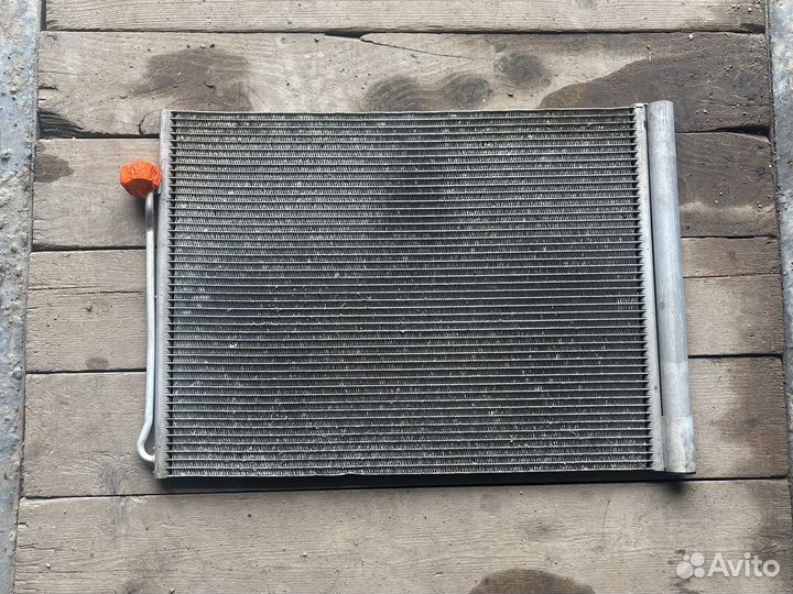 Радиатор кондиционера e70