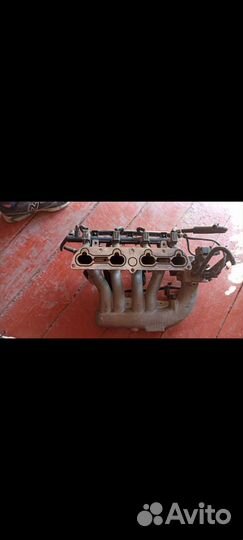 Выпускной коллектор на kia spectra 2006 года