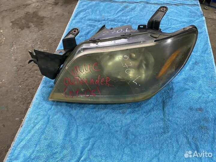 Фара левая Mitsubishi Outlander