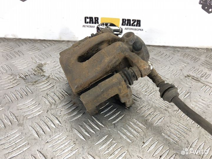 Суппорт задний правый R Land Rover Freelander