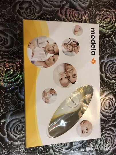 Молокоотсос medela
