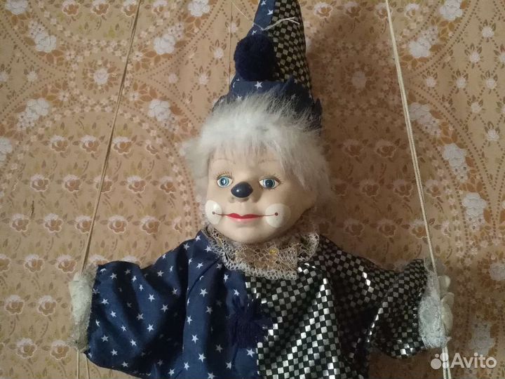 Клоун на качелях. Игрушка. Германия