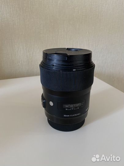 Объектив sigma 35 mm 1.4 canon