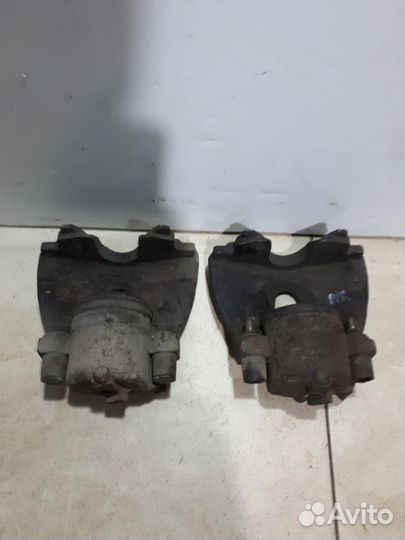 Суппорт передний левый Opel Astra H 2004-2014