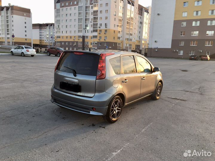 Комплект бамперов rider на Nissan Note E 11