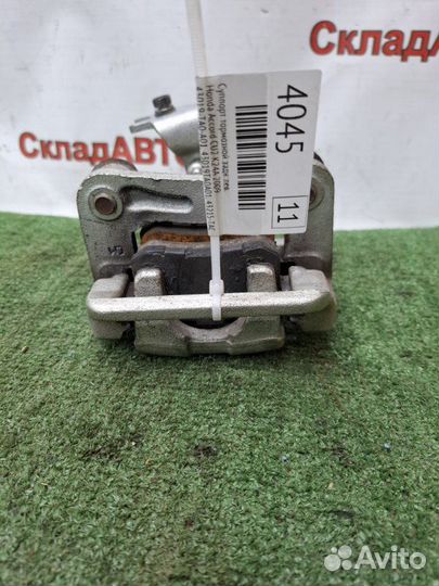 Суппорт тормозной задний левый Honda Accord CU2