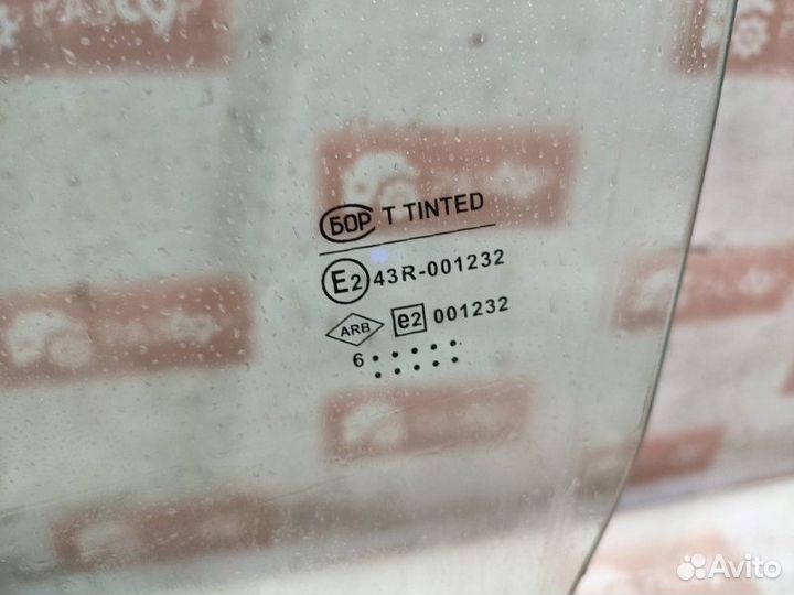Стекло двери переднее левое Renault Logan LS0G K7J