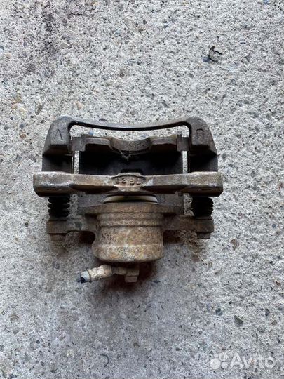 Суппорт тормозной передний левый Chevrolet Lacetti