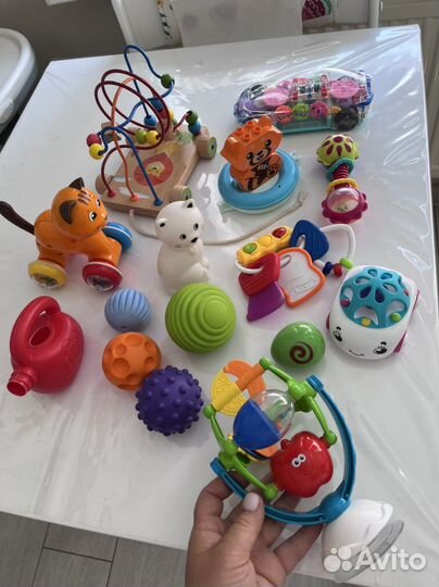 Игрушки погремушки тактилики развивающие