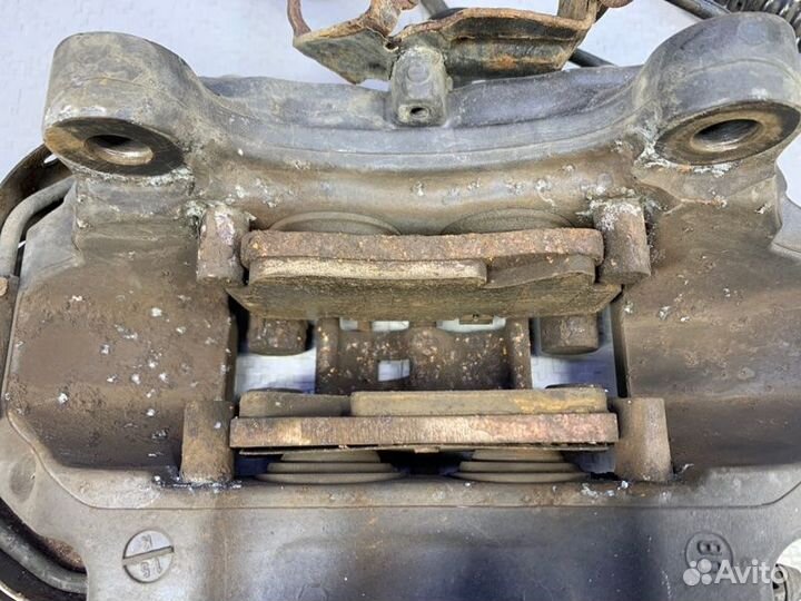 Тормозной суппорт задний правый Touareg GP