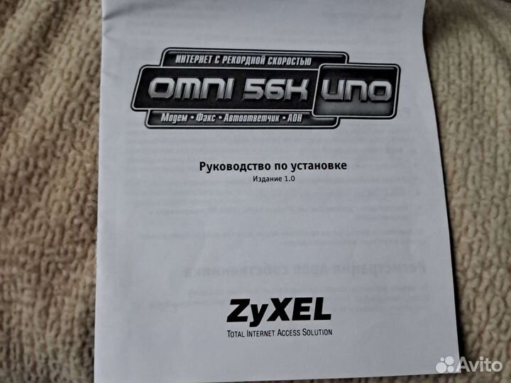 Модем Zyxel omni 56k uno