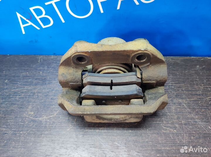 Суппорт тормозной задний SsangYong Rexton 1