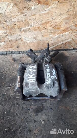 Суппорт задний левый Opel Insignia 2008-2017