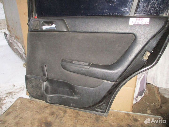 Обшивка двери задней правой Opel Astra G