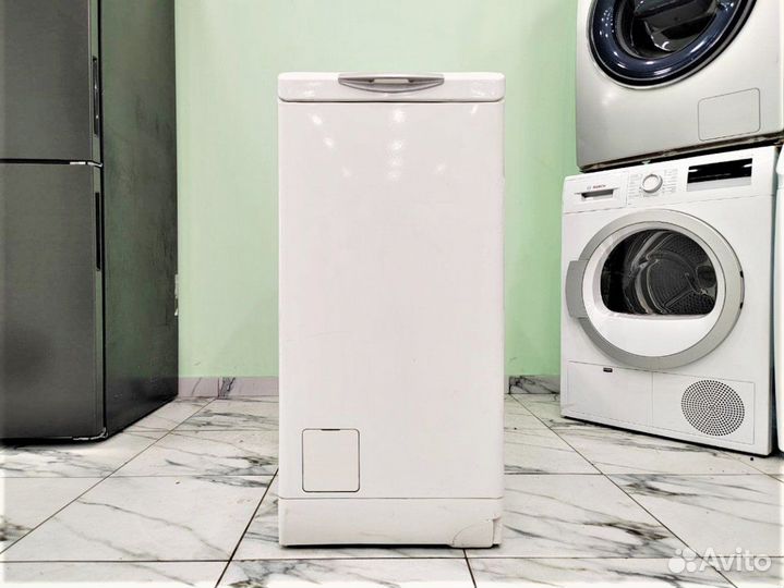 Машина с вертикальной загрузкой бу Electrolux