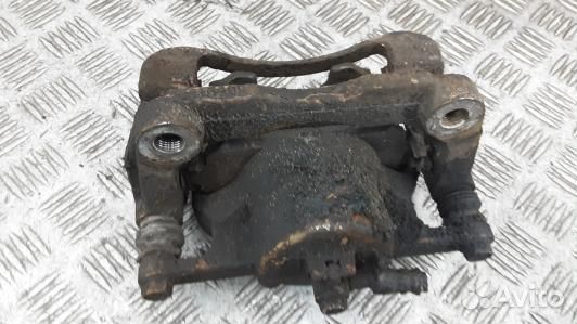 Суппорт тормозной передний левый nissan qashqai J1