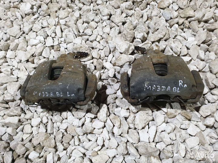 Суппорт передний Mazda 3 BL