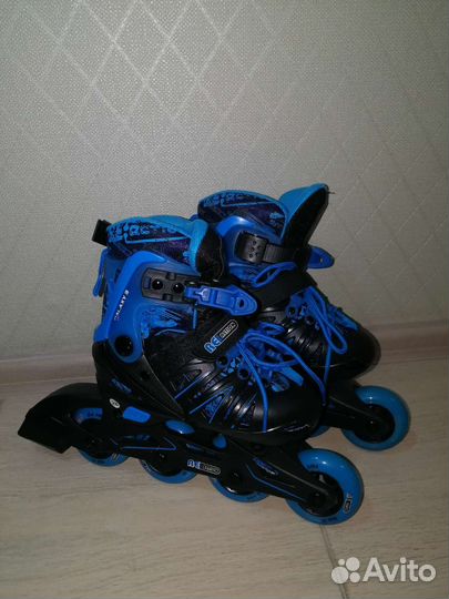 Роликовые коньки