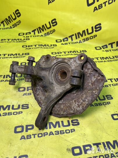 Кулак поворотный передний левый Mitsubishi Lancer