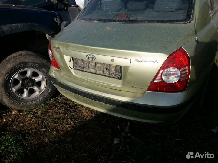 Крышка багажника Elantra xd бампер фонарь