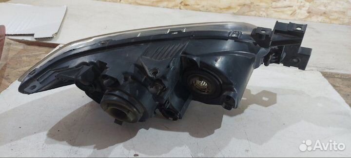 Фара галогеновая передняя левая Mazda Mazda3 BK