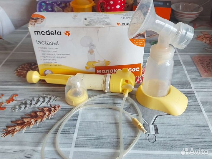 Молокоотсос medela ручной