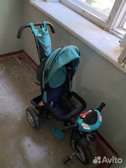 Трехколесный велосипед с ручкой