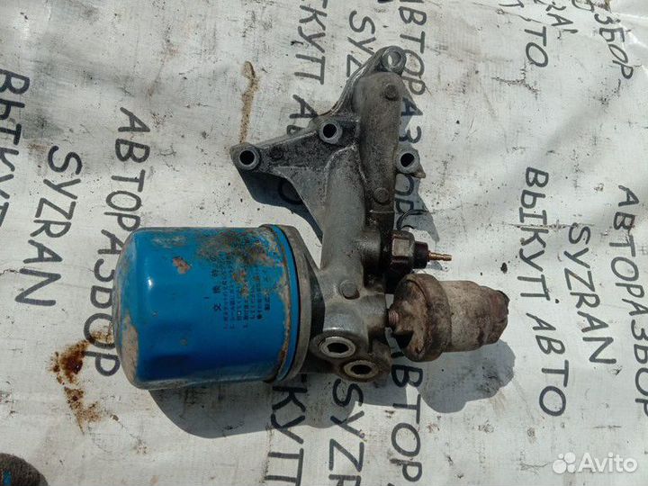 Крепление масляного фильтра Isuzu Bighorn трупер