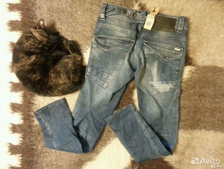 Джинсы новые
