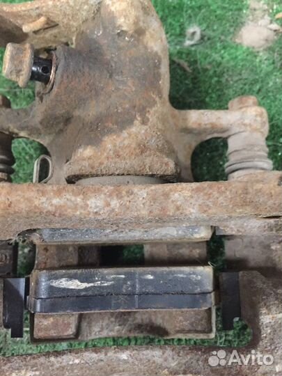 Суппорт задний правый Hyundai Solaris RB G4FC 2012