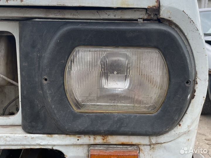 Раф 2203 накладка на левую фару