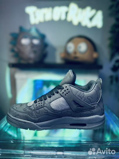 Кроссовки nike air jordan 4 kaws серые