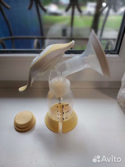 Молокоотсос medela ручной