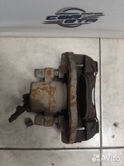Суппорт тормозной передний левый Ford Focus седан