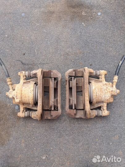 Суппорт тормозной передний Opel Corsa C