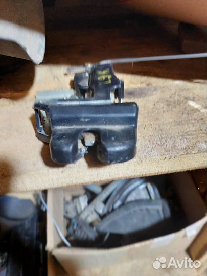 Замок багажника Мицубиси Лансер 9