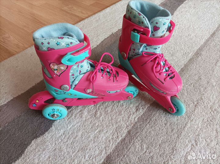 Роликовые коньки