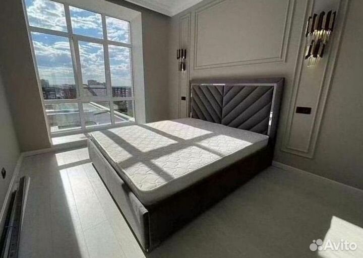 Кровать с подъемным механизмом