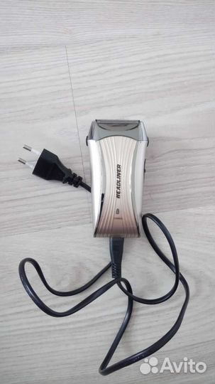 Электробритва с триммером