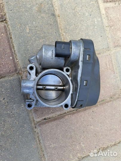 Дроссельная заслонка